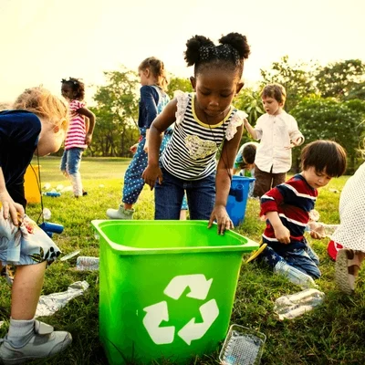 kids-learning-how-recycle-trash-600nw-1099645115